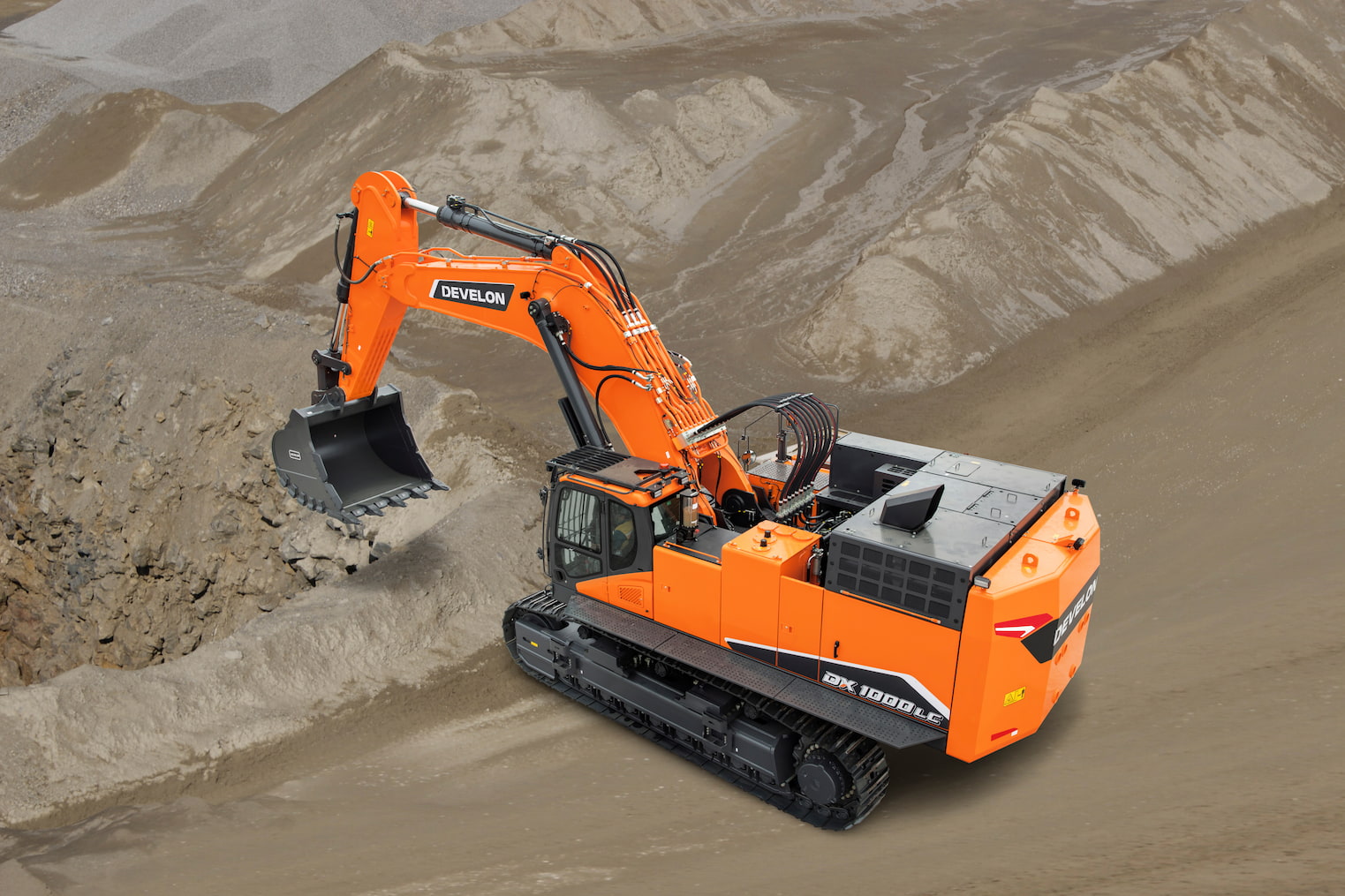 Excavator in action showcasing after-sales support for heavy equipment from Develon, ensuring reliable performance on rugged job sites.